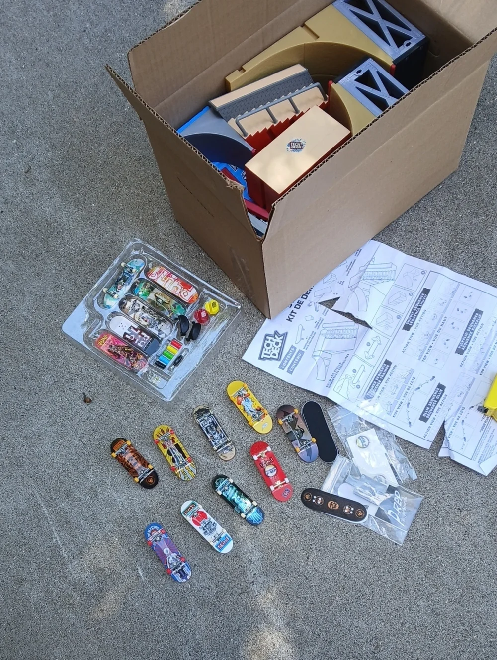 Tech Deck finger skateboard lot, includes multiple miniature boards